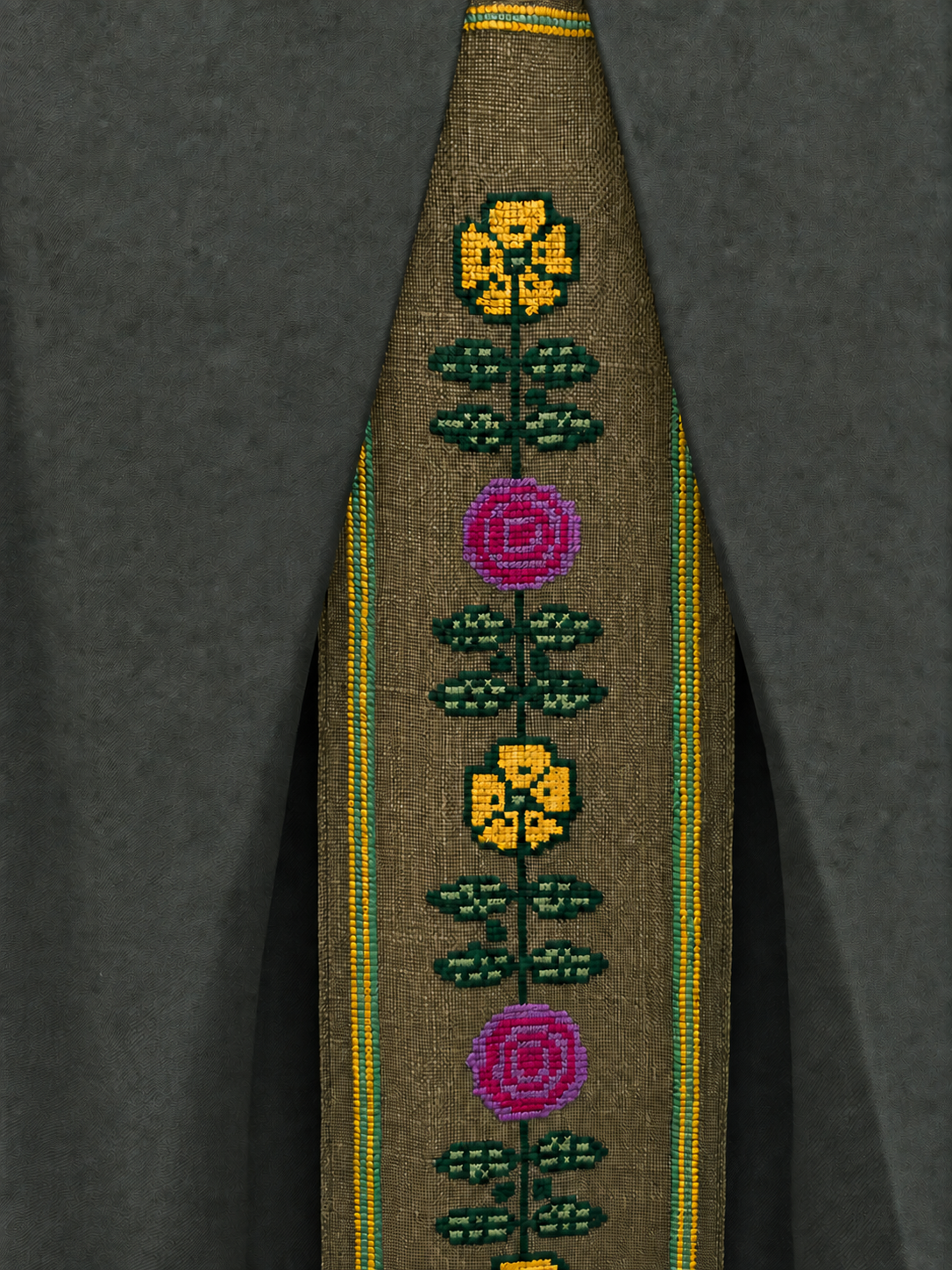 Moldovan embroidery with yellow flowers, magenta roses and green leaves on olive cloth