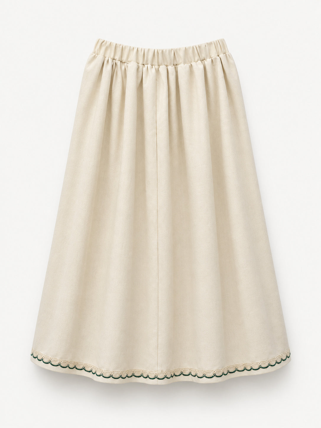 Cream skirt with green crocheted motifs and a delicate lace-trimmed hem