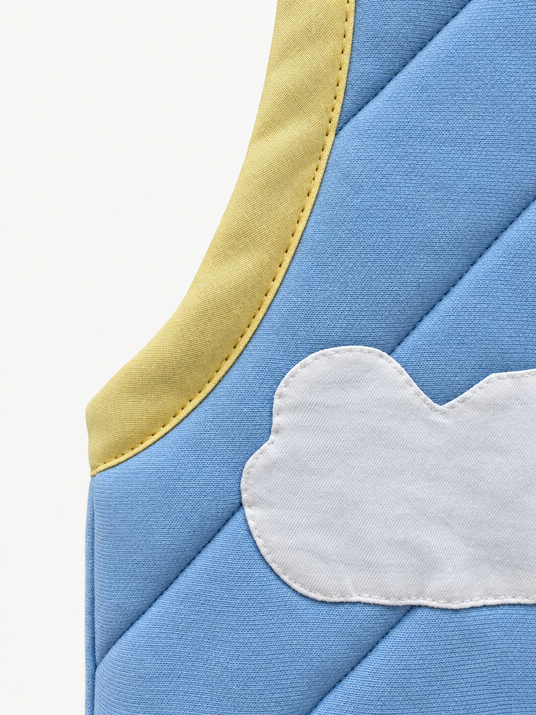 A Pocket of Sky Vest — cloud appliqué and quilting detail