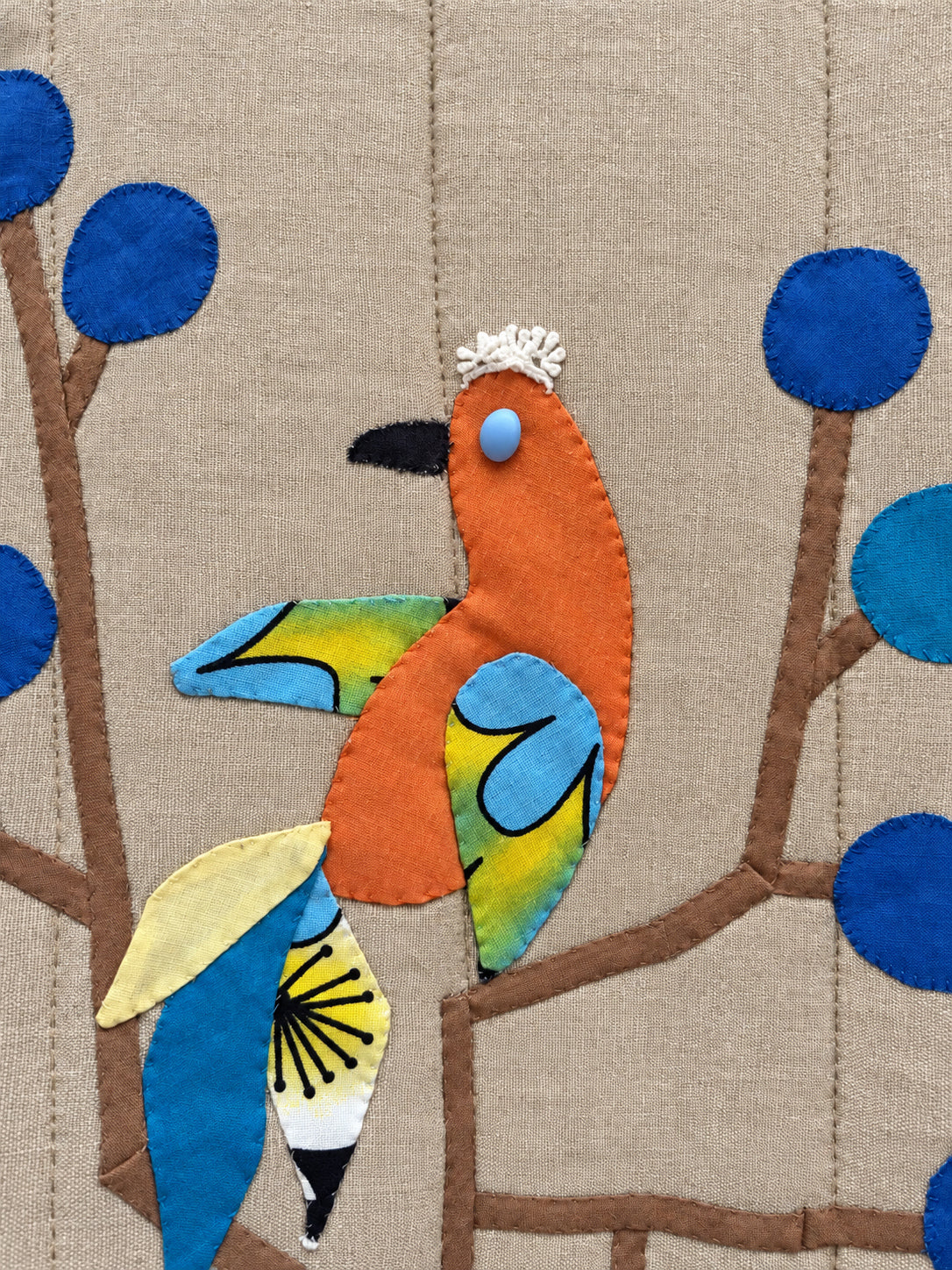 Blue Bird Vest — full back view with bird appliqué