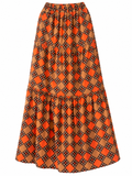 Calendula Soviet baika skirt in orange, camel and brown geometric print — front view