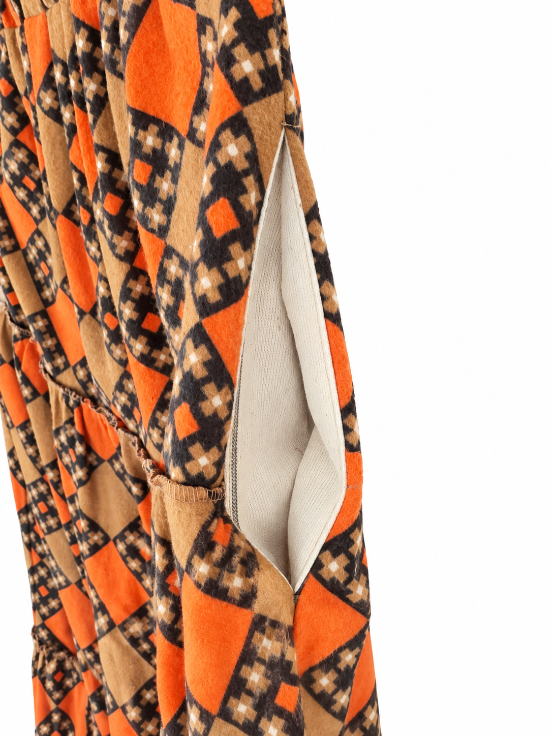 Calendula Soviet baika skirt in orange, camel and brown geometric print — pocket view