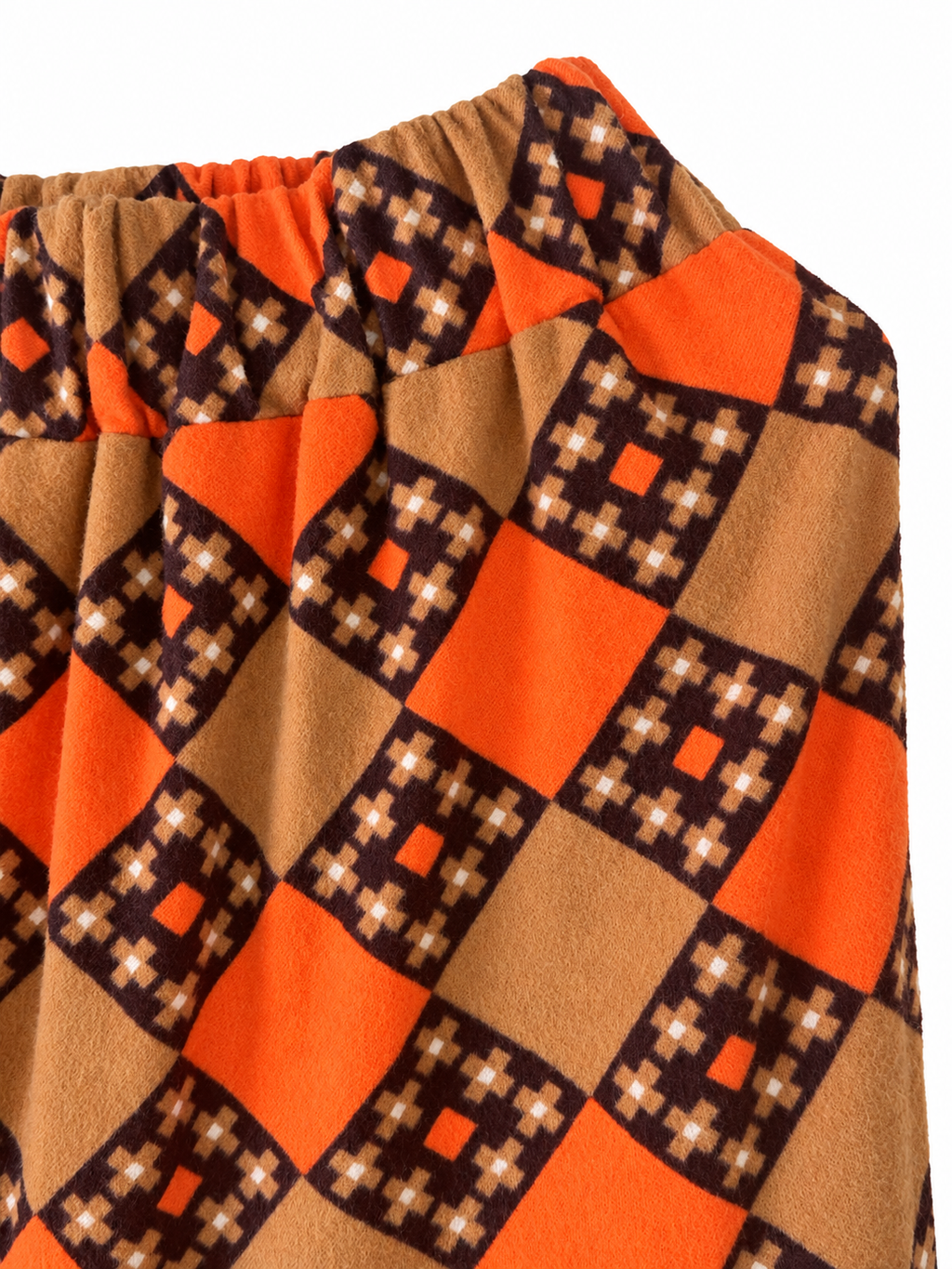 Calendula Soviet baika skirt in orange, camel and brown geometric print — waist view