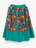 Colourful cat-print skirt with a turquoise waistband and wide turquoise hem