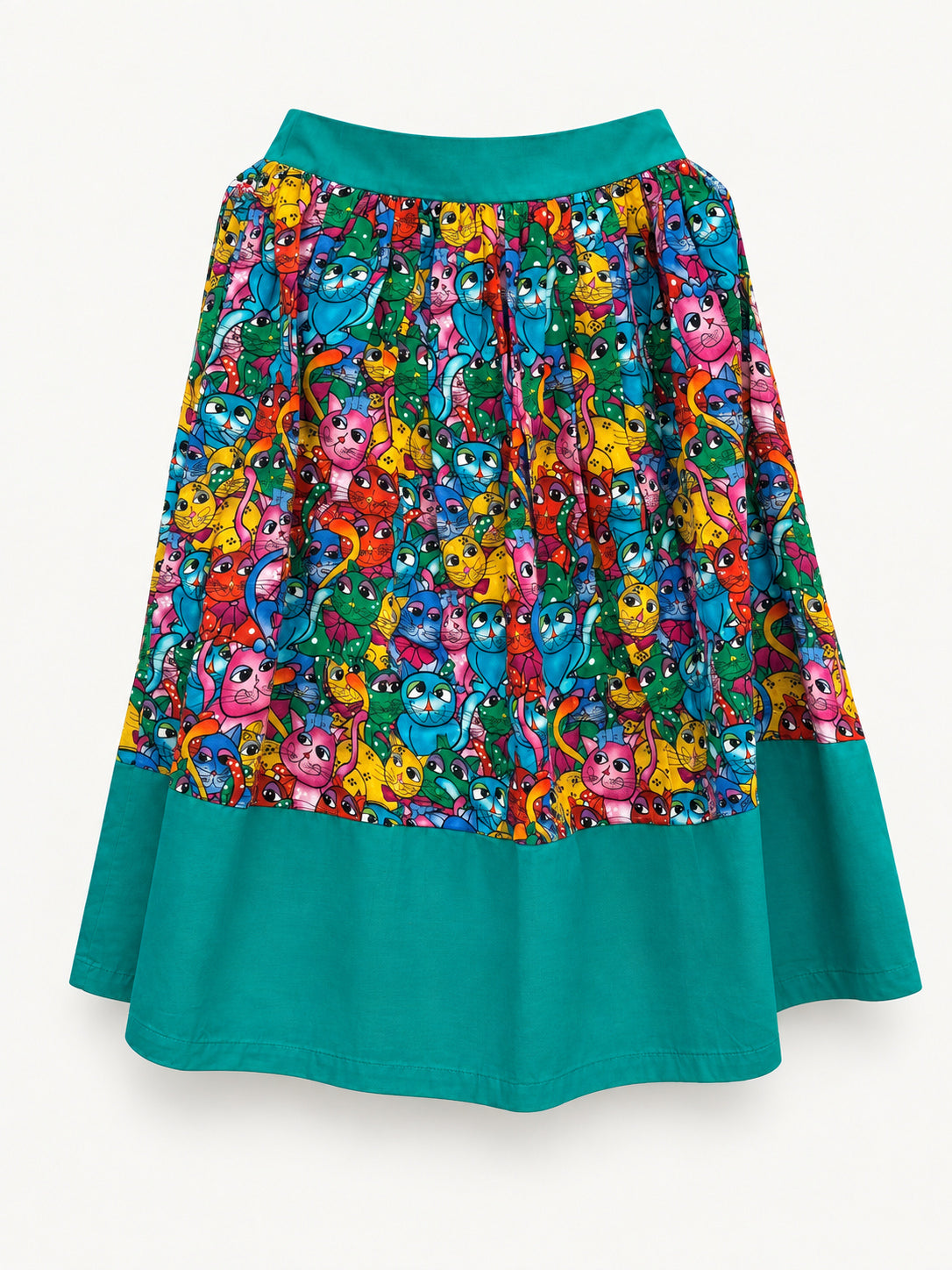 Colourful cat-print skirt with a turquoise waistband and wide turquoise hem