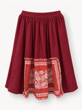 Daisies from Cologne — deep-red skirt with a vintage daisy napkin panel