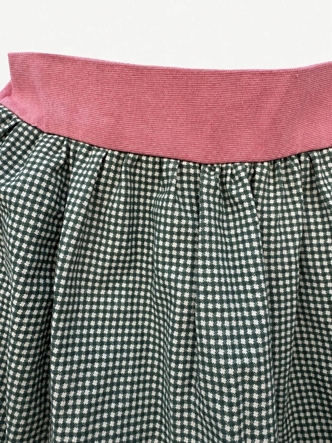 Dusty-pink elastic waistband and vintage green checked fabric