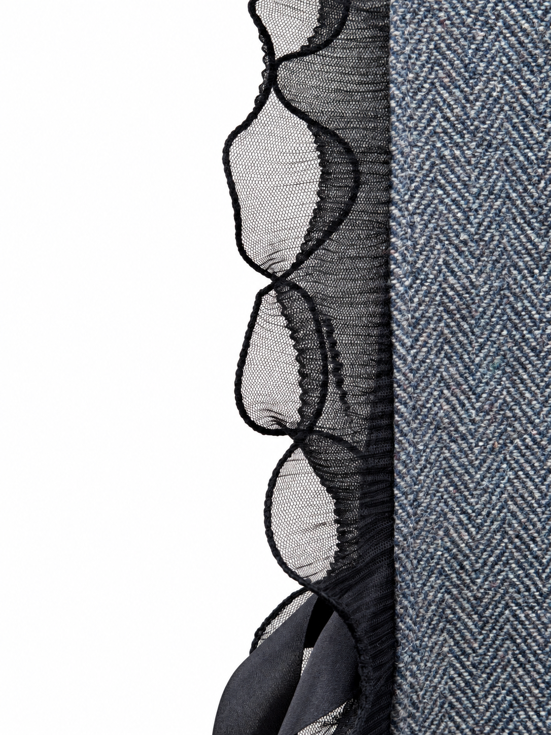 Sheer black mesh ruffle and ribbon detail