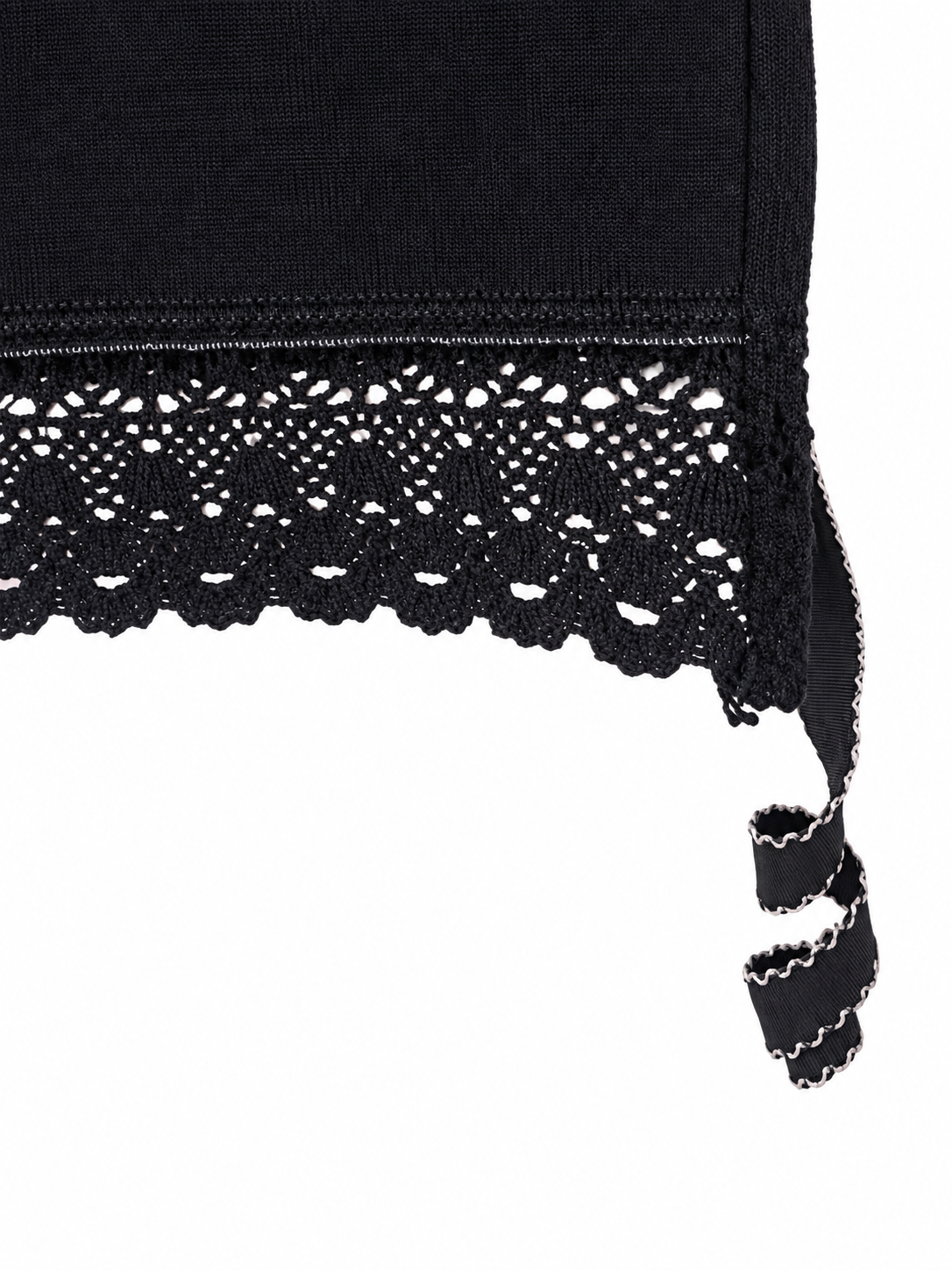 Evening Primrose dark vest with blush crochet panel and lace hem — hem view