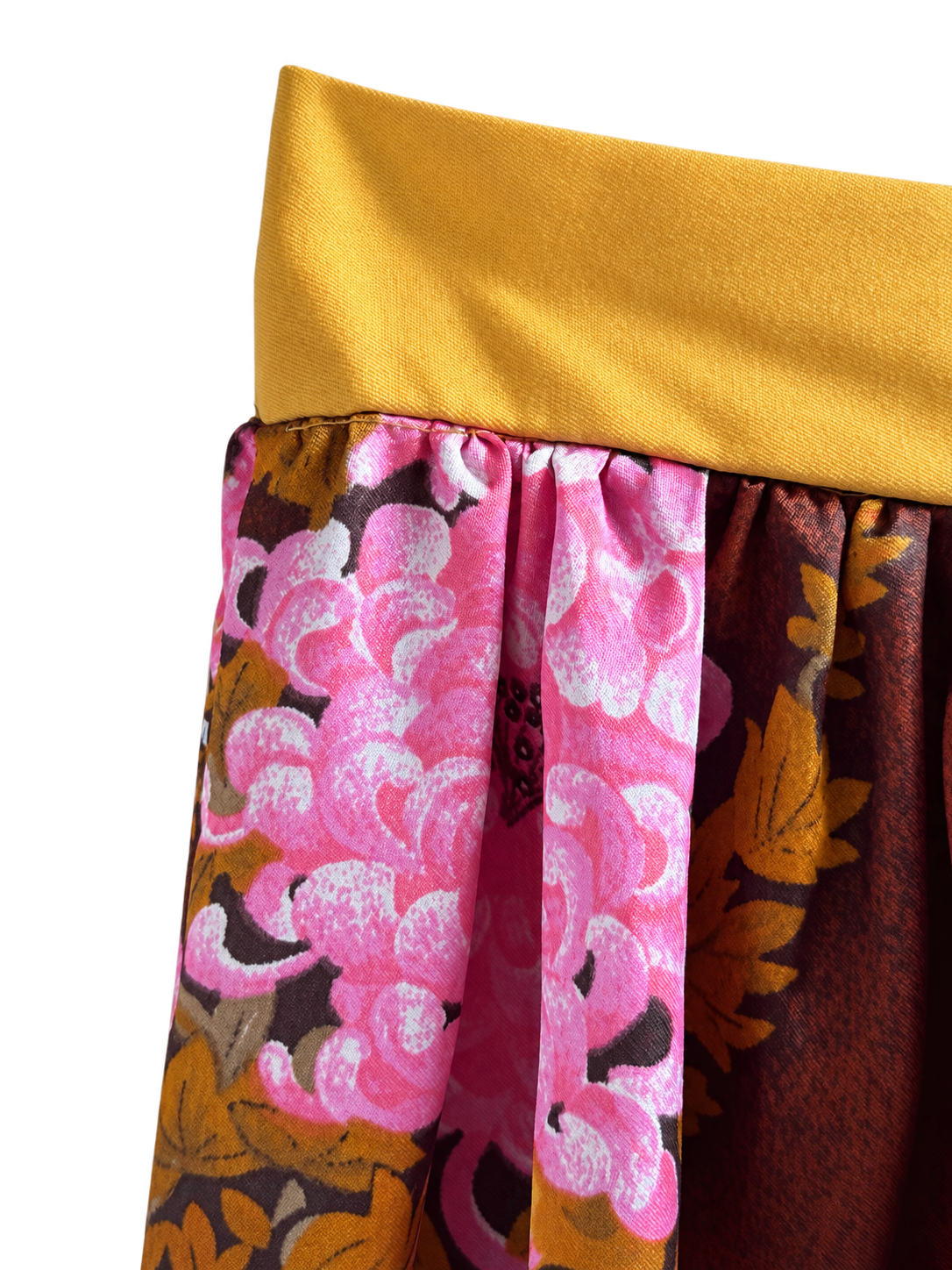 Golden waistband detail