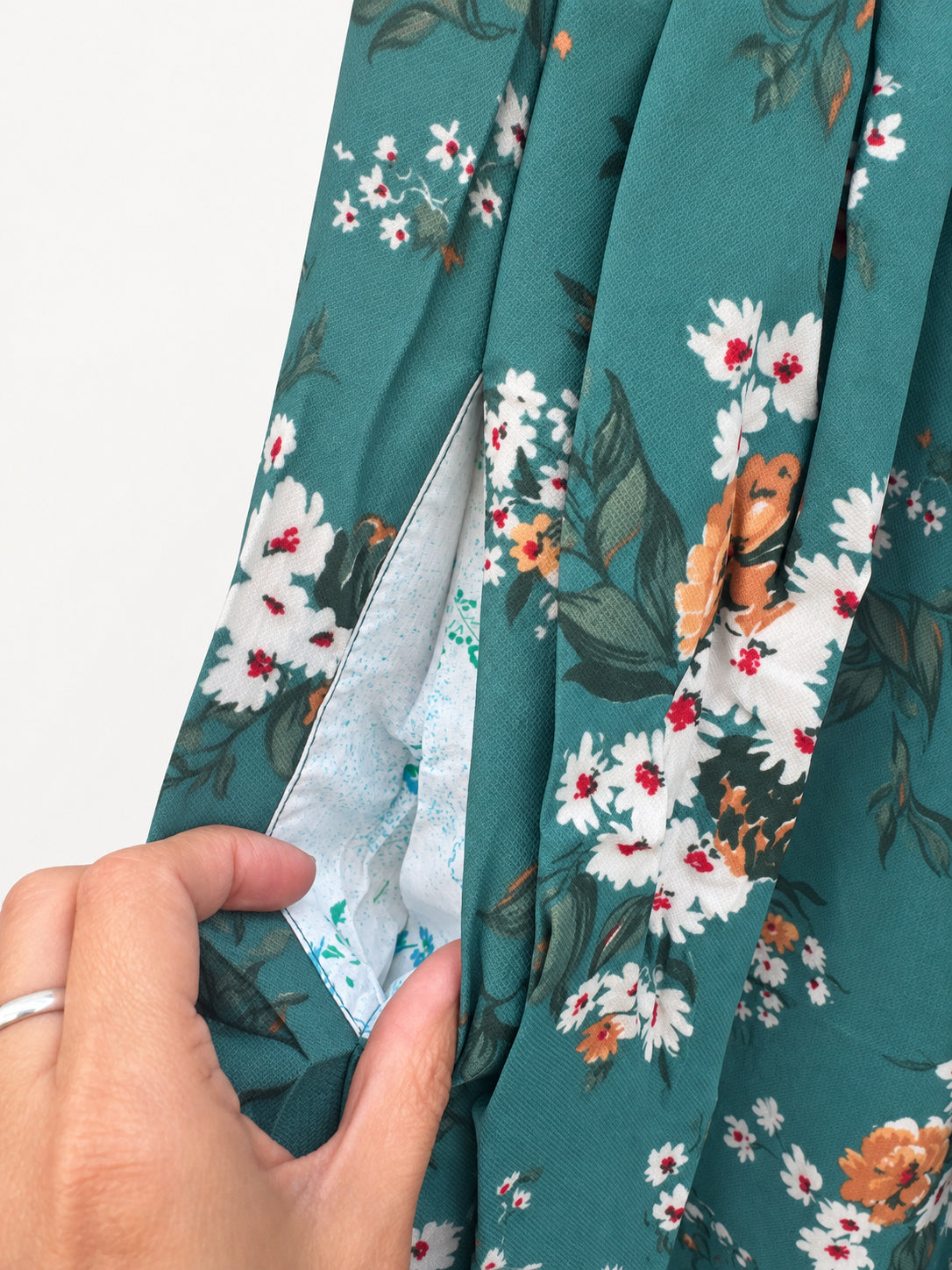 Detail of side pocket and its contrasting lining