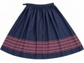 Navy wool skirt with red geometric border on white