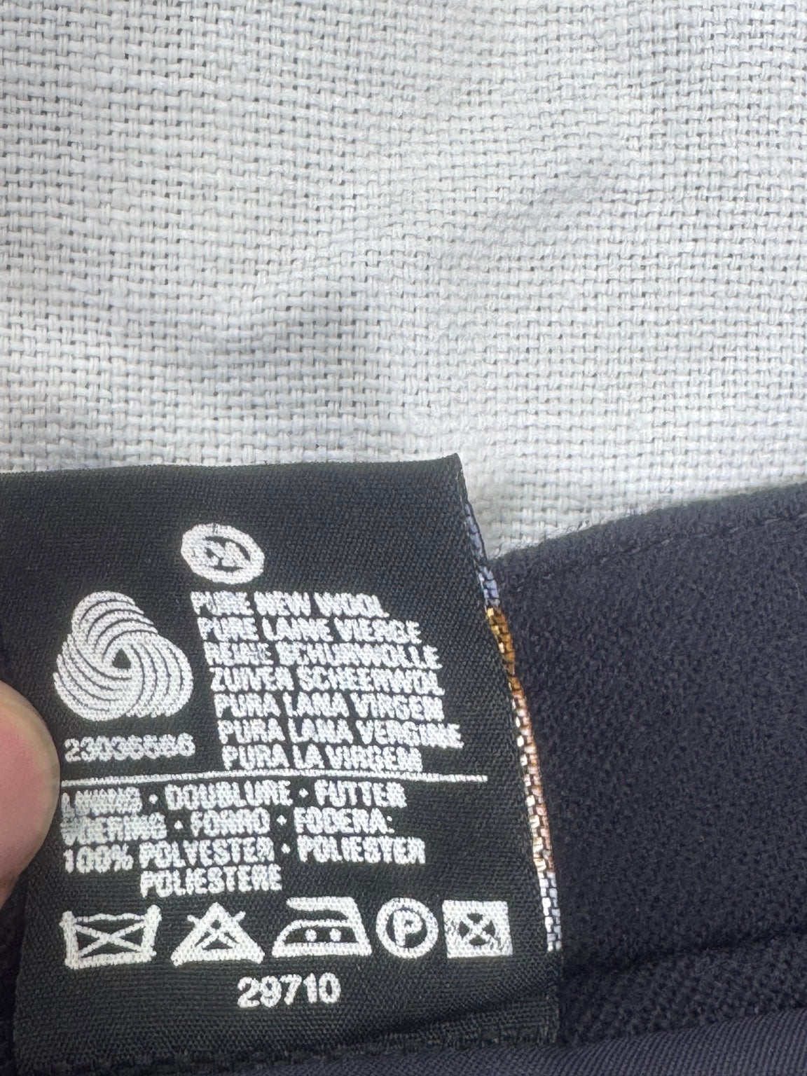 Original label: pure new wool, lining 100% polyester