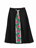 Black wool skirt with vintage Moldovan floral embroidery, front view