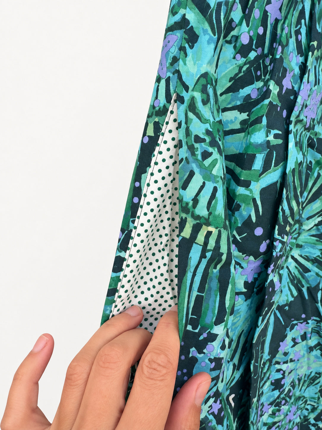 Teal patterned skirt with a purple waistband and wide purple hem