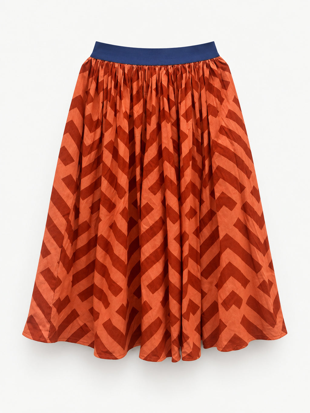 Orange geometric-print skirt with a navy-blue elastic waistband
