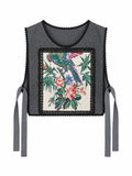 Parrot’s Garden grey herringbone vest — front view with black lace and colourful bird embroidery