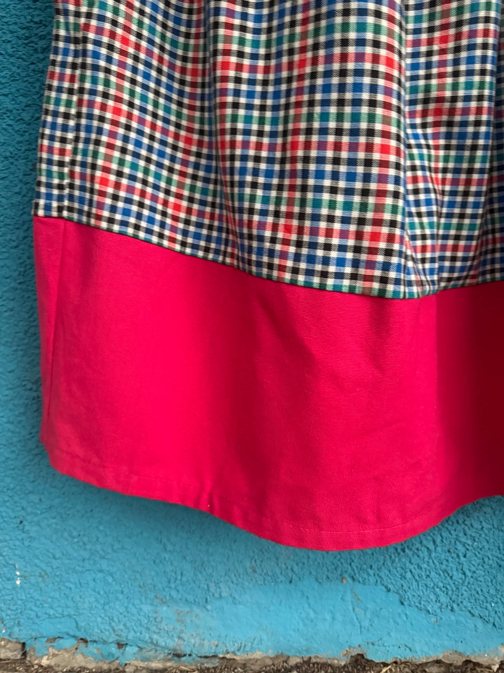Red Check Skirt — fabric and hem detail