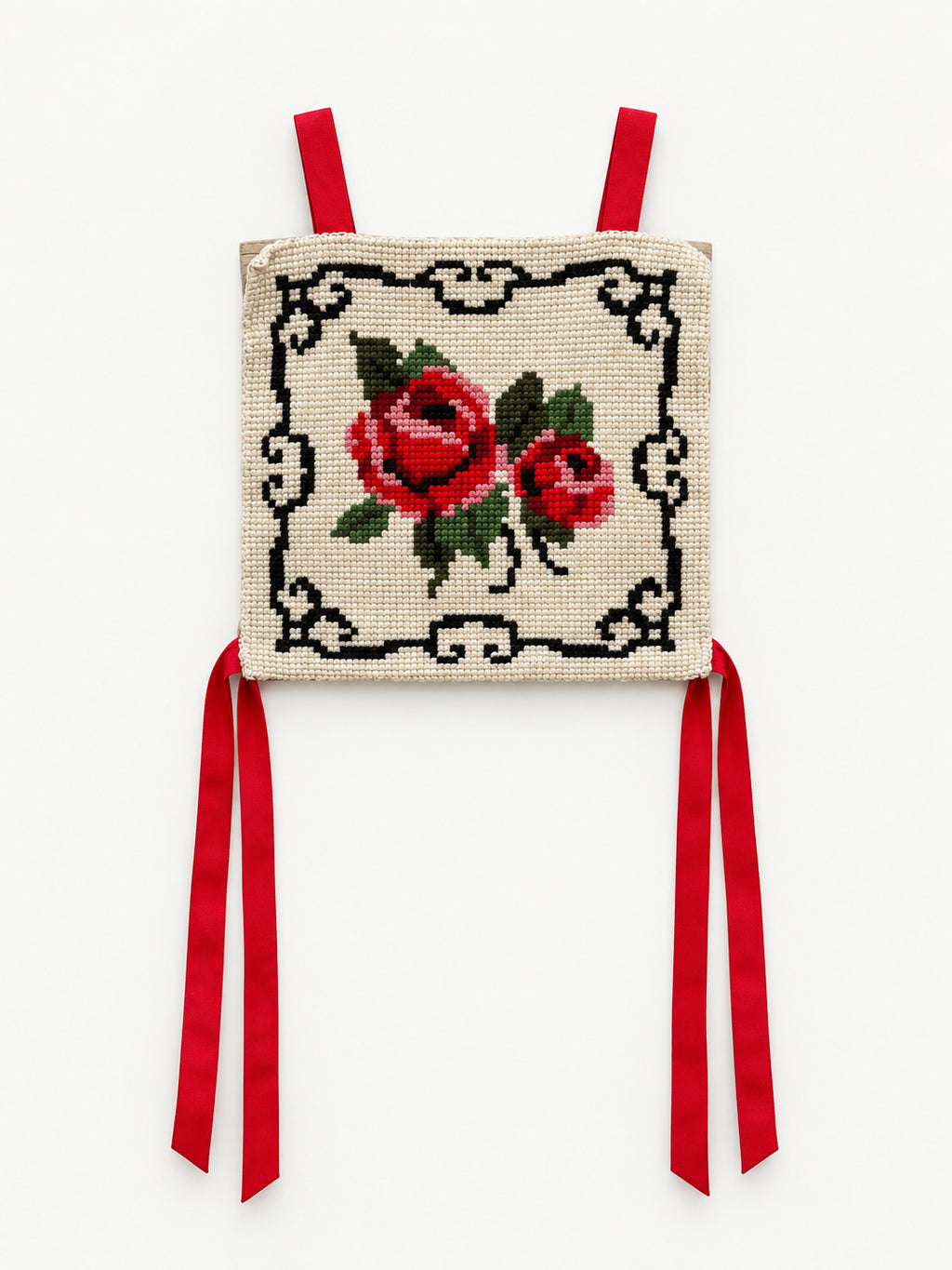 Vintage cream top with red rose needlework, black decorative border and red ribbon ties