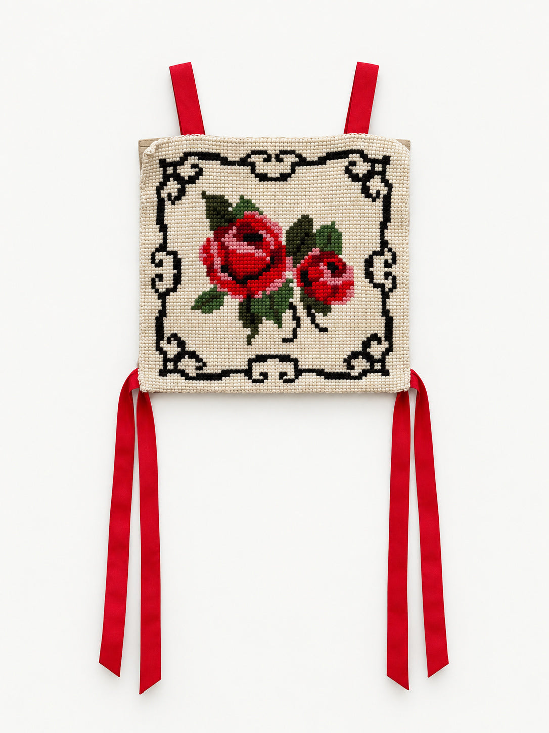 Vintage cream top with red rose needlework, black decorative border and red ribbon ties