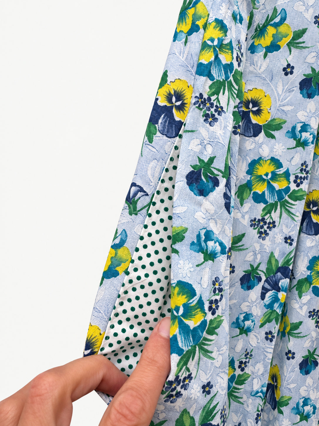 Pale-blue floral summer skirt with yellow and blue pansies, green elastic waistband and gathered lower tier