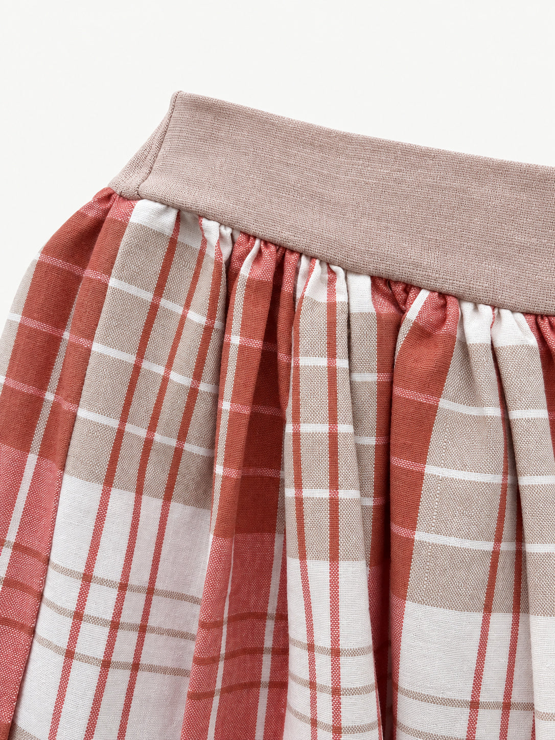 Terracotta-pink and cream checked skirt with pale-pink waistband and wide hem