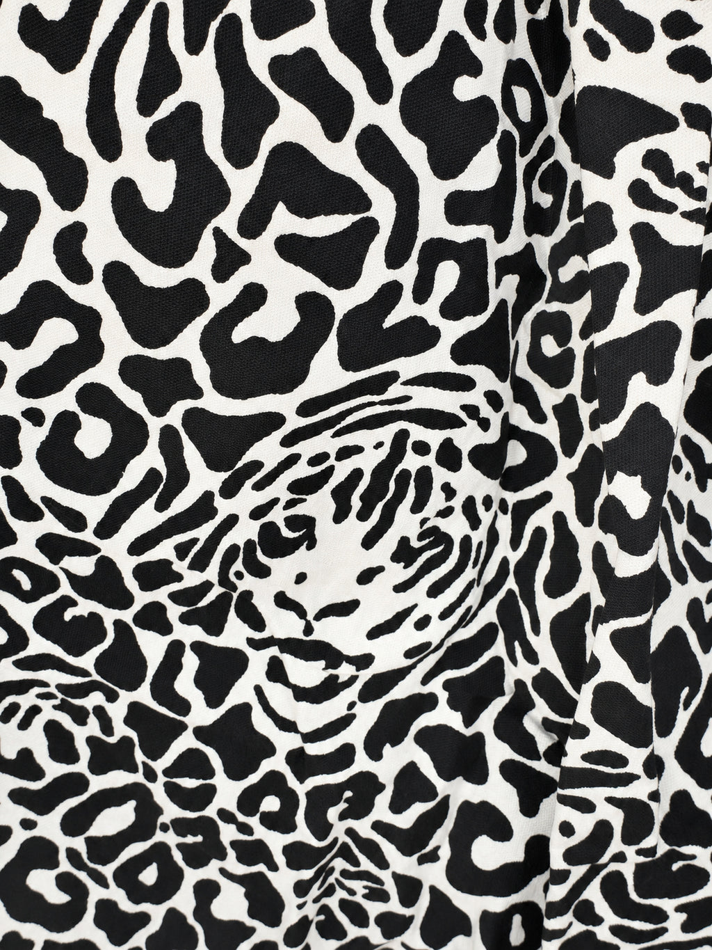 Black-and-cream leopard-print skirt with a wide yellow hem