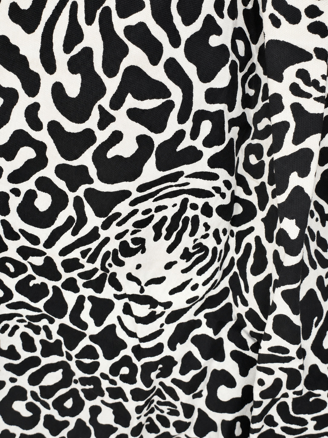 Black-and-cream leopard-print skirt with a wide yellow hem