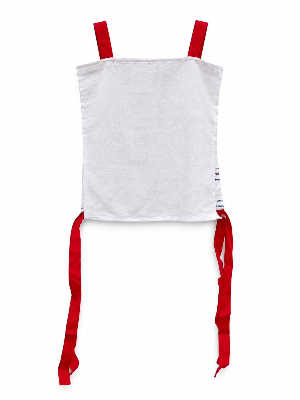 Plain white back of embroidered top with red shoulder straps and long side ribbons