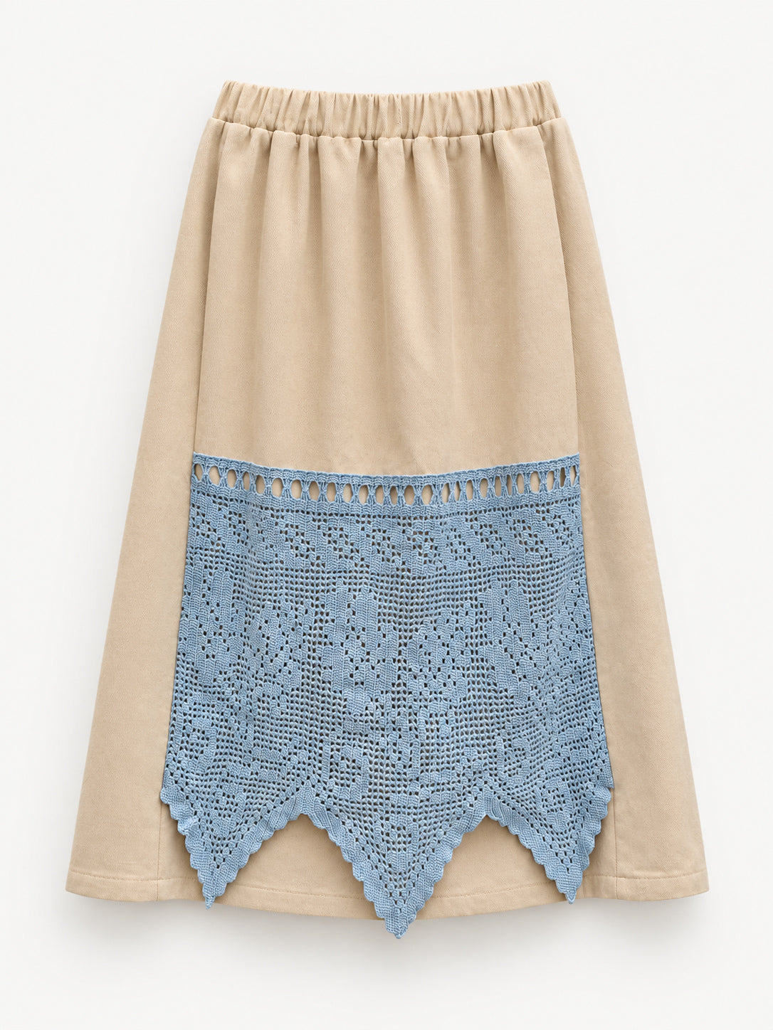Full front view of cream winter skirt with pale-blue hand-crocheted curtain panel
